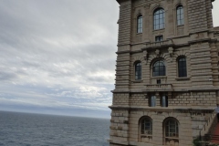 The building hanging off the clff